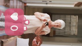 Animation of social media heart icons with numbers over senior couple dancing. social media, communication and digital interface concept digitally generated video. - Powered by Shutterstock - Get 15% off with code: PIKWIZARD15