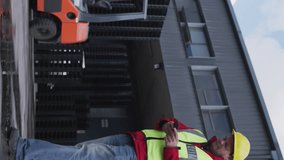 Animation of data on screens over caucasian male warehouse worker with smartphone. Global shipping, networks, business, finances, computing and data processing concept digitally generated video. - Powered by Shutterstock - Get 15% off with code: PIKWIZARD15