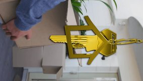 Animation of gold house key and key fob over happy couple by house. Home, property, ownership and lifestyle concept digitally generated video. - Powered by Shutterstock - Get 15% off with code: PIKWIZARD15