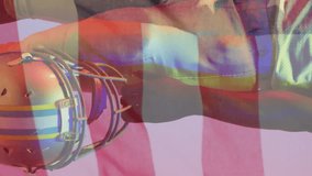 Animation of african american football player with helmet and flag of usa. American patriotism, sports and competition concept digitally generated video. - Powered by Shutterstock - Get 15% off with code: PIKWIZARD15