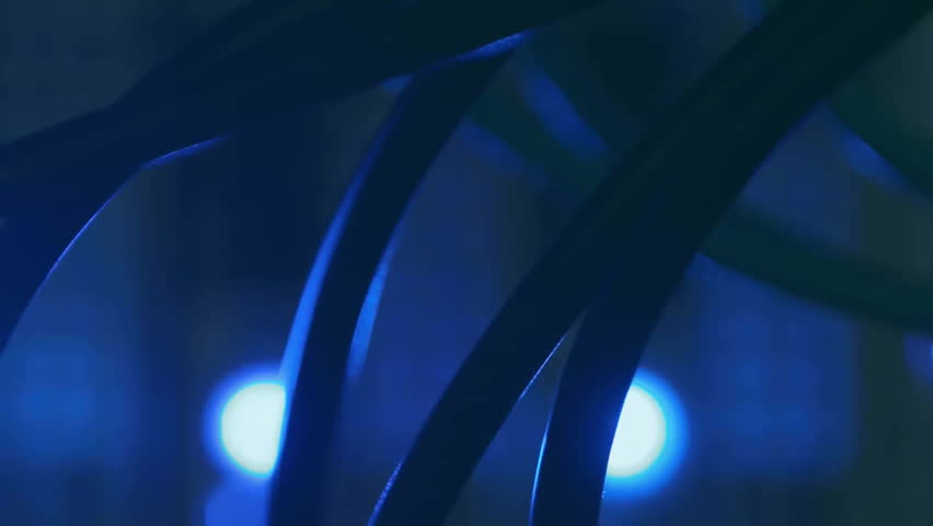 Animation of computer language and soundwaves over close up of wires in server room. Digital composite, multiple exposure, coding, programming language, data center, networking and technology. - Powered by Shutterstock - Get 15% off with code: PIKWIZARD15