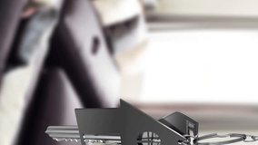 Silver house keys hanging against interior of modern living room in background. real estate and house ownership concept - Powered by Shutterstock - Get 15% off with code: PIKWIZARD15