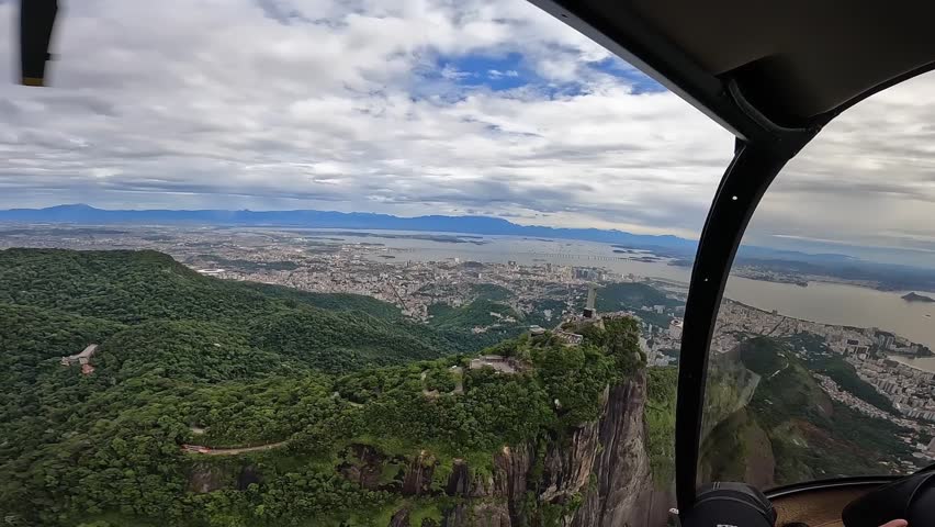 Aerial view of Rio de Janeiro from a helicopter with Christ the Redeemer.