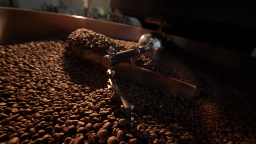 Coffee roasting process, turning raw beans into aromatic perfection.
