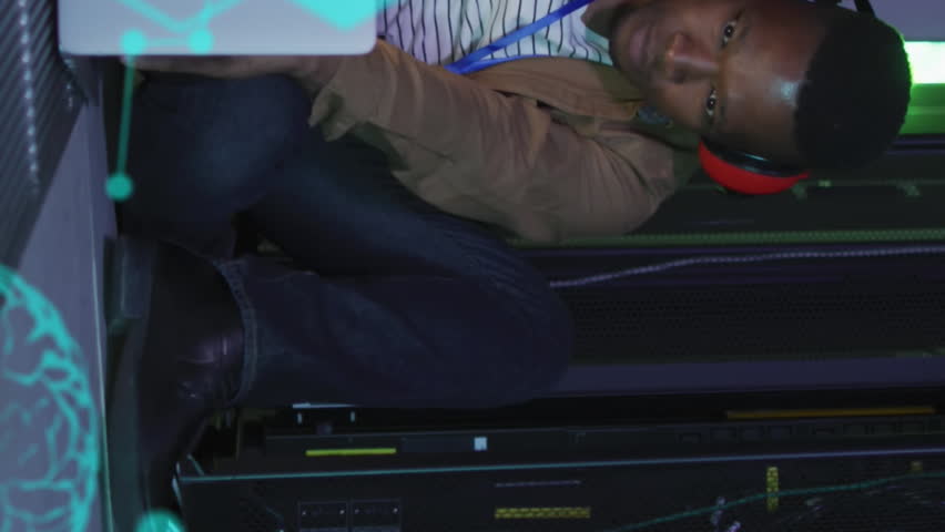 Animation of brains, molecule structures, computer language, african american man using laptop. Server room, digital composite, anatomy, artificial intelligence, coding and technology concept. - Powered by Shutterstock - Get 15% off with code: PIKWIZARD15