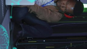 Animation of brains, molecule structures, computer language, african american man using laptop. Server room, digital composite, anatomy, artificial intelligence, coding and technology concept. - Powered by Shutterstock - Get 15% off with code: PIKWIZARD15