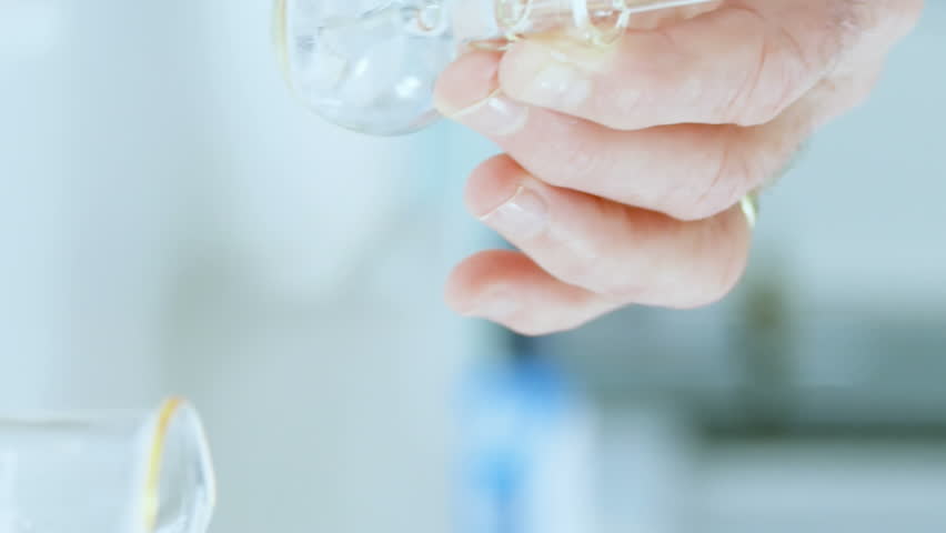 Animation of mathematical equations on mid section of scientist performing experiment at laboratory. Medical research and science technology concept - Powered by Shutterstock - Get 15% off with code: PIKWIZARD15