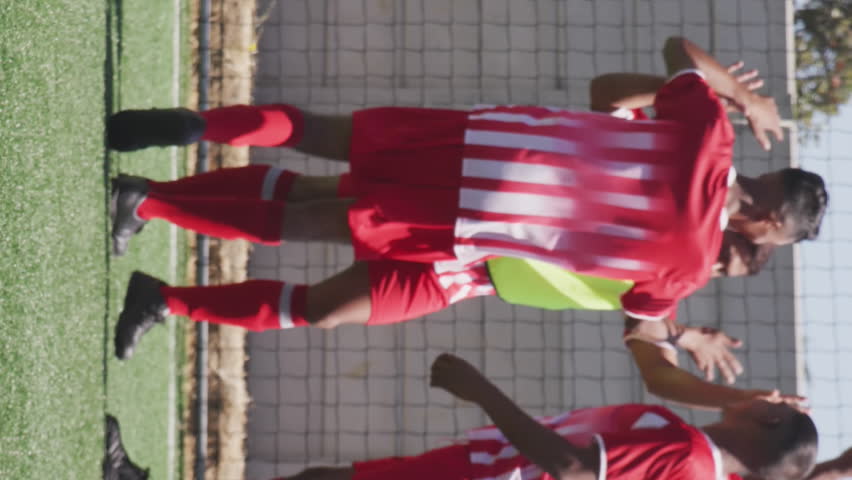 Animation of social media icons over team of diverse male soccer players celebrating on sports field. Social media networking and sports fitness concept - Powered by Shutterstock - Get 15% off with code: PIKWIZARD15