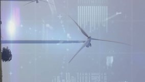 Animation of graphs, binary codes and computer language over windmills against sky. Digital composite, multiple exposure, report, business, growth, coding, technology, sustainable energy concept. - Powered by Shutterstock - Get 15% off with code: PIKWIZARD15