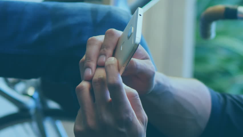 Animation of scope scanning and data processing over man using smartphone. digital interface, global technology, connection and communication concept digitally generated video. - Powered by Shutterstock - Get 15% off with code: PIKWIZARD15