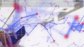 Red graphs moving and network of connections against woman in hijab using smartphone. global networking and business technology concept - Powered by Shutterstock - Get 15% off with code: PIKWIZARD15