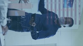 Animation of financial data processing over diverse business people with face masks at meeting. global business and digital interface during covid 19 pandemic concept digitally generated video. - Powered by Shutterstock - Get 15% off with code: PIKWIZARD15