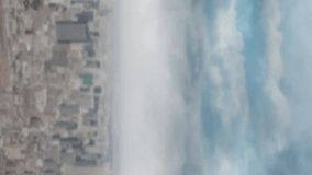 Animation of emoji icons flying over cityscape with clouded sky 4k - Powered by Shutterstock - Get 15% off with code: PIKWIZARD15