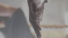 Animation of subscribers notification over man chalking hands to weight lift at gym. Fitness, exercise, strength, social media, digital interface and communication digitally generated video. - Powered by Shutterstock - Get 15% off with code: PIKWIZARD15