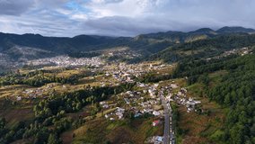 Stunning aerial footage of Quetzaltenango, Guatemala — dramatic highland mountains, misty valleys, lush forests, and winding roads showcasing the beauty of Central America’s landscapes - Powered by Shutterstock - Get 15% off with code: PIKWIZARD15