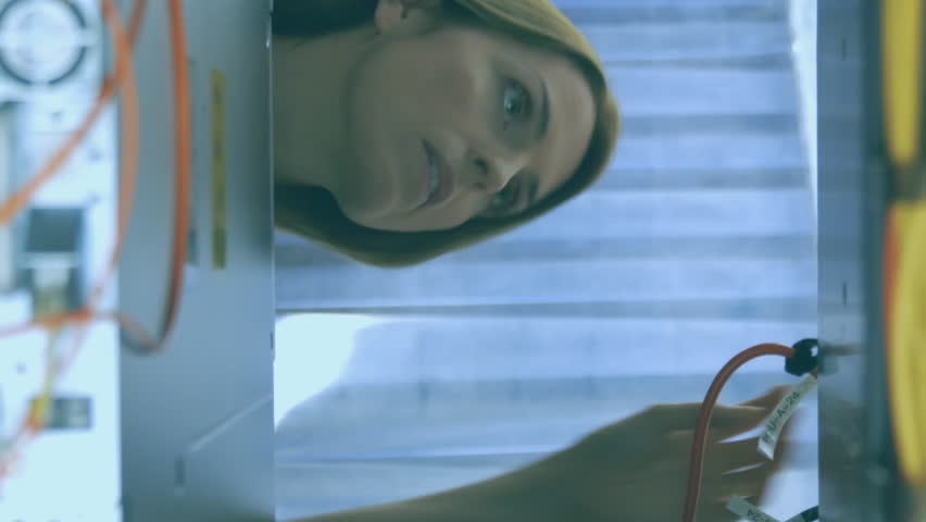 Animation of data processing over caucasian female engineer connecting computer wires. computers, network, data processing, technology and digital interface concept digitally generated video. - Powered by Shutterstock - Get 15% off with code: PIKWIZARD15