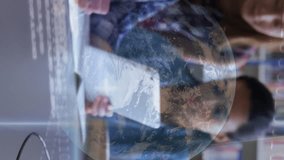 Animation of data processing binary coding over students in classroom. global education, digital interface and networks concept digitally generated video. - Powered by Shutterstock - Get 15% off with code: PIKWIZARD15