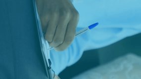 Animation of data processing and round scanners over mid section of businessman writing on clipboard. Computer interface and business technology concept - Powered by Shutterstock - Get 15% off with code: PIKWIZARD15