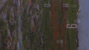 Animation of multiple changing numbers and statistical data processing against network towers. Global networking and business data technology concept - Powered by Shutterstock - Get 15% off with code: PIKWIZARD15