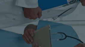 Animation of financial data processing over caucasian male doctors with stethoscopes. Global medicine, business, finances, computing and data processing concept digitally generated video. - Powered by Shutterstock - Get 15% off with code: PIKWIZARD15