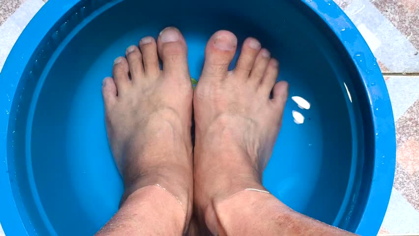 Soaking  the feet in warm water, indoor Chiangmai Thailand.