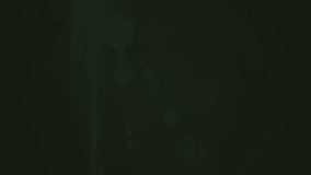 Animation of glowing spots of lights over dark background. colour, movement and energy background concept, digitally generated video. - Powered by Shutterstock - Get 15% off with code: PIKWIZARD15