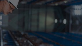 Animation of data processing over caucasian male worker in warehouse. Global business and digital interface concept digitally generated video. - Powered by Shutterstock - Get 15% off with code: PIKWIZARD15