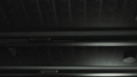 Animation of screens with programming language and numbers moving over data server racks. Digital composite, networking, data center, security, technology, network server, coding, data processing. - Powered by Shutterstock - Get 15% off with code: PIKWIZARD15