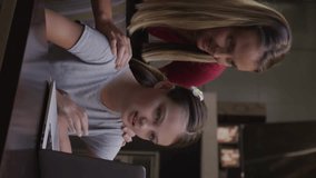 Animation of mathematical equations over students using laptop in classroom. Global business finances connections and digital interface concept digitally generated video. - Powered by Shutterstock - Get 15% off with code: PIKWIZARD15