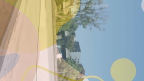 Animation of colourful spots over caucasian man skateboarding. global sport and digital interface concept digitally generated video. - Powered by Shutterstock - Get 15% off with code: PIKWIZARD15