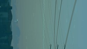 Animation of hearts falling over high voltage lines. Global science, connections, data processing and digital interface concept digitally generated video. - Powered by Shutterstock - Get 15% off with code: PIKWIZARD15