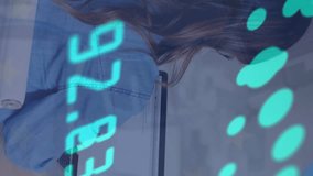 Animation of data processing over caucasian businesswoman using laptop. Global business, finances and digital interface concept digitally generated video. - Powered by Shutterstock - Get 15% off with code: PIKWIZARD15