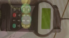Animation of financial data processing over smartphone and payment terminal. Global business, finance, online payment and data processing concept digitally generated video. - Powered by Shutterstock - Get 15% off with code: PIKWIZARD15