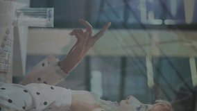 Animation of financial data processing over woman using phone. Global business, finances, computing and data processing concept digitally generated video. - Powered by Shutterstock - Get 15% off with code: PIKWIZARD15