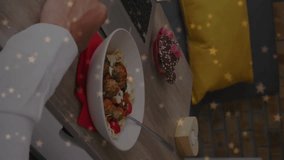 Animation of hearts falling over caucasian man eating pasta having video call with caucasian woman. Valentine day, celebration and communication concept digitally generated video. - Powered by Shutterstock - Get 15% off with code: PIKWIZARD15