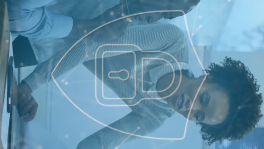 Animation of network of connections with padlock over diverse businesspeople in office. Global cyber security, connections, computing and data processing concept digitally generated video. - Powered by Shutterstock - Get 15% off with code: PIKWIZARD15