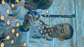 Microprocessor connections against asian male doctor teaching to use asthma inhaler to caucasian boy. Medical healthcare and technology concept - Powered by Shutterstock - Get 15% off with code: PIKWIZARD15