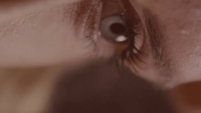 Animation of digital screen with data processing over eye of caucasian woman. Data processing, communication, bionic eye and technology concept digitally generated video. - Powered by Shutterstock - Get 15% off with code: PIKWIZARD15