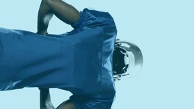 Animation of shapes over african american male american football player on blue background. Sport, shopping and retail concept digitally generated video. - Powered by Shutterstock - Get 15% off with code: PIKWIZARD15