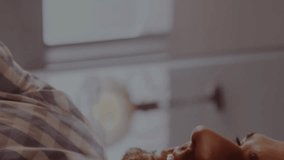 Animation of multicolored trading board over caucasian man scanning phone and paying to barista. Digital composite, multiple exposure, stock market, banking, finance, report and business concept. - Powered by Shutterstock - Get 15% off with code: PIKWIZARD15