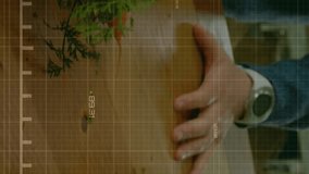 Animation of graph and numbers over cropped hands using nfc technology over cellphone. Digital composite, multiple exposure, report, finance, banking, grocery store, growth and technology concept. - Powered by Shutterstock - Get 15% off with code: PIKWIZARD15