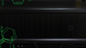 Animation of computer language and molecule structures against server room. Digital composite, multiple exposure, anatomy, medical, coding, data server, technology and network server concept. - Powered by Shutterstock - Get 15% off with code: PIKWIZARD15