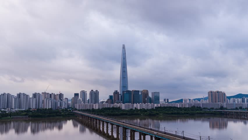 Zoom in and out, Seoul Subway and Seoul City Skyline at Han river Seoul, South korea. July 19, 2025