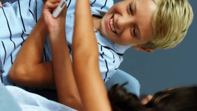 Animation of notification bars over diverse children trying to snatch digital tablet from each other. Digital composite, multiple exposure, childhood, social media reminder, togetherness, technology. - Powered by Shutterstock - Get 15% off with code: PIKWIZARD15