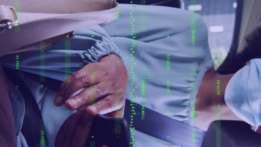 Animation of financial data processing and woman in face mask in car. Covid 19 pandemic, medicine, healthcare, finance, computing and data processing concept digitally generated video. - Powered by Shutterstock - Get 15% off with code: PIKWIZARD15