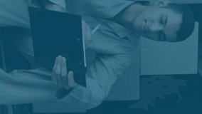 Animation of data processing against caucasian delivery man wiriting on clipboard in delivery van. Future concept of supply chain and logistic network business - Powered by Shutterstock - Get 15% off with code: PIKWIZARD15