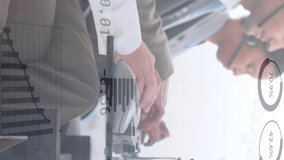 Animation of stock market data processing over diverse colleagues talking on phone headset at office. Global economy and business data technology concept - Powered by Shutterstock - Get 15% off with code: PIKWIZARD15