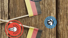 Animation of digital media icons over german flags on wooden background. Germany, network, connection, data, digital interface and communication, digitally generated video. - Powered by Shutterstock - Get 15% off with code: PIKWIZARD15