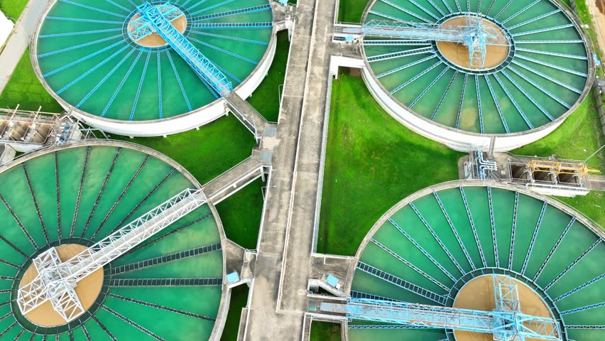 Aerial drone view of wastewater treatment plant showcasing safety protocols and infrastructure designed to protect public health and ensure clean, treated water discharge.
