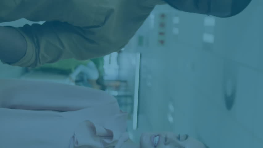 Animation of financial data processing over diverse colleagues discussing work in office. Global business, finances and digital interface concept digitally generated video. - Powered by Shutterstock - Get 15% off with code: PIKWIZARD15